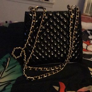 Black patent leather pocketbook with chain handle